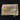 Tarjetero imperio de bronce con buitres s.XX