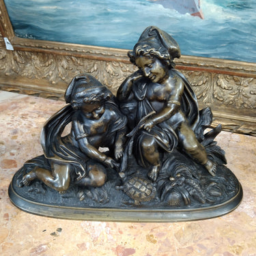 Figura bronce niños con tortuga Bucarest Art Gallery