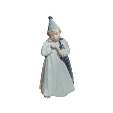 Figura porcelana Royal Copenhagen 'Niño en piyama con paraguas' Bucarest Art Gallery