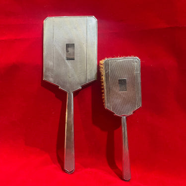 Conjunto espejo de mano y peinador inglés de plata  estilo Art Decó marca Barker Brothers Silver