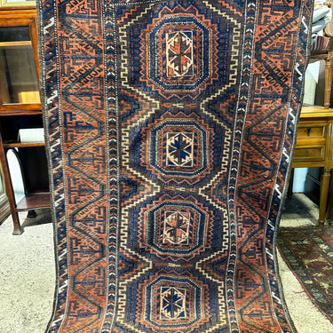 Alfombra Tribal Caucásica hecha a mano en lana, tonos naranjos y azules 100cm x 175cm