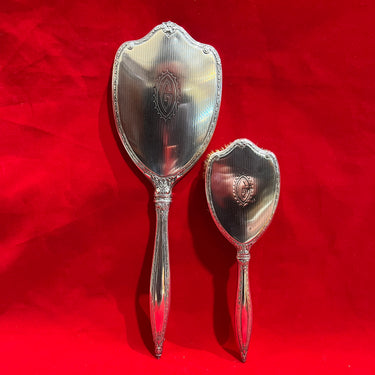 Conjunto espejo de mano y peinador de plata 925 y crin natural marca International Sterling circa 1940
